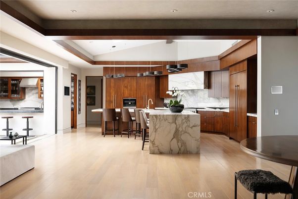 Interior, Kitchen, Marble Walls, Pendant Lights, Recessed Lighting, Stainless Steel Appliances, Wood Texture Flooring
