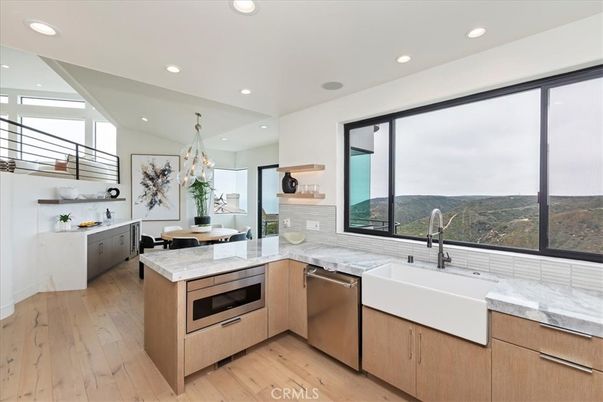 Chandelier, Dining room, Interior, Kitchen, Recessed Lighting, Stainless Steel Appliances, Wood Texture Flooring