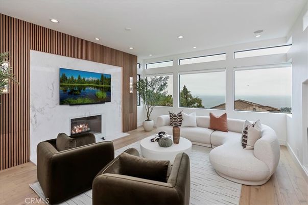 Fireplace, Interior, Living room, Recessed Lighting, Water, Wood Texture Flooring, Wooden Walls