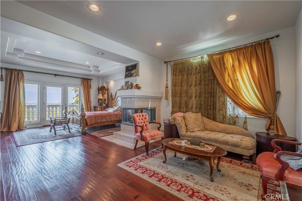 Bedroom, Fireplace, Interior, Living room, Recessed Lighting, Wood Texture Flooring
