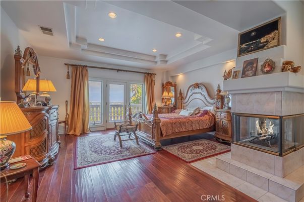 Bedroom, Fireplace, Interior, Recessed Lighting, Wood Texture Flooring