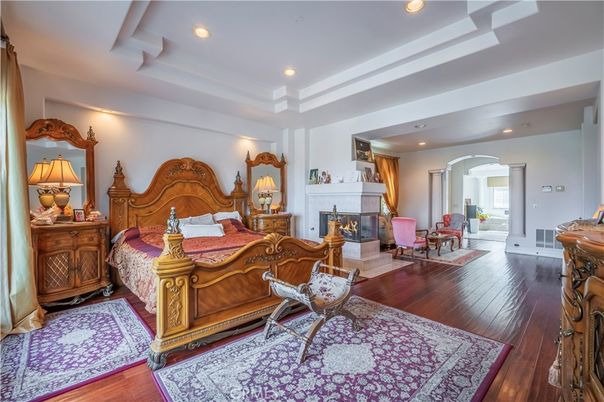 Bedroom, Fireplace, Interior, Recessed Lighting, Wood Texture Flooring