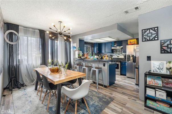 Dining room, Interior, Kitchen, Pendant Lights, Stainless Steel Appliances, Wood Texture Flooring