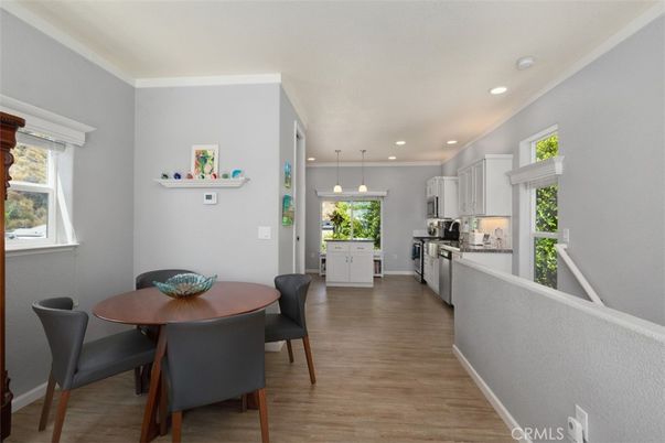 Dining room, Interior, Kitchen, Pendant Lights, Recessed Lighting, Stainless Steel Appliances, Wood Texture Flooring