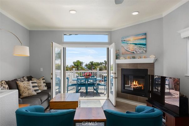 Dining room, Fireplace, Interior, Living room, Recessed Lighting, Wood Texture Flooring