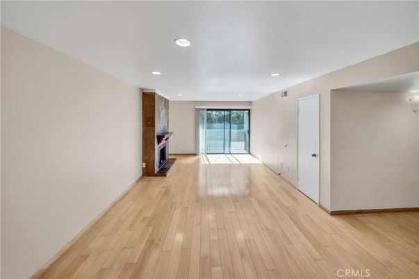 Empty room, Fireplace, Interior, Recessed Lighting, Wood Texture Flooring