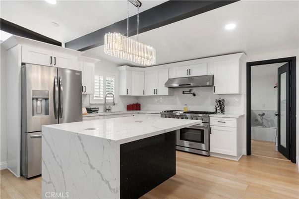 Chandelier, Interior, Kitchen, Recessed Lighting, Stainless Steel Appliances, Wood Texture Flooring