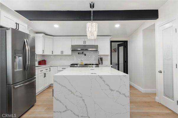 Chandelier, Interior, Kitchen, Pendant Lights, Recessed Lighting, Stainless Steel Appliances, Wood Texture Flooring
