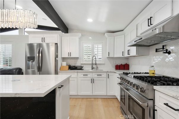 Chandelier, Interior, Kitchen, Recessed Lighting, Stainless Steel Appliances, Wood Texture Flooring
