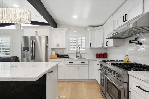 Chandelier, Interior, Kitchen, Recessed Lighting, Stainless Steel Appliances, Wood Texture Flooring