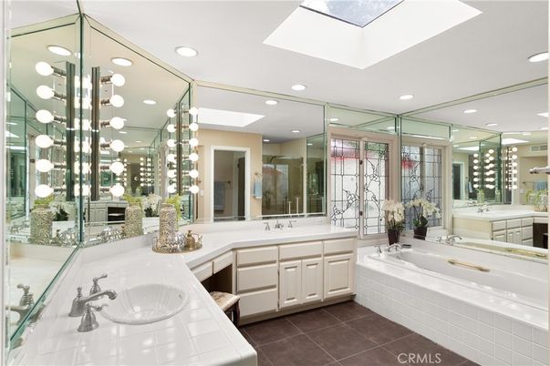 Bathroom, Dual Sink Vanities, Glass Shower, Interior, Pendant Lights, Recessed Lighting, Tile Countertops