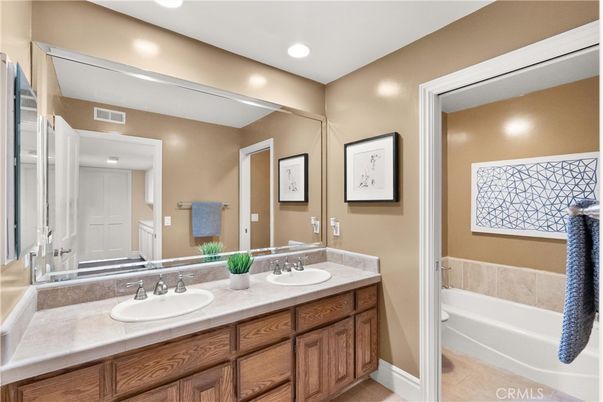 Bathroom, Dual Sink Vanities, Interior, Recessed Lighting, Tile Countertops