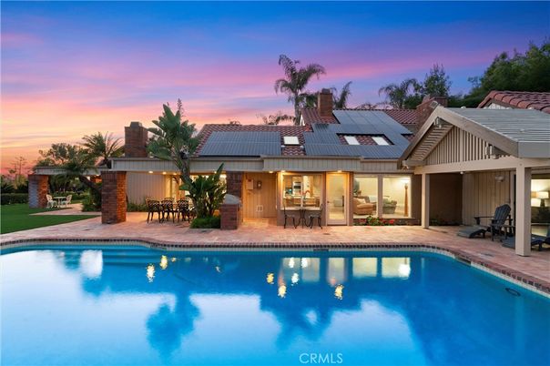 Exterior, Pool, Solar Panels