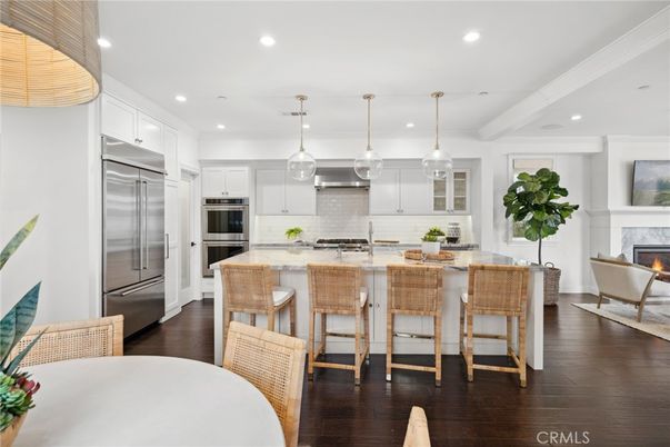 Fireplace, Interior, Kitchen, Pendant Lights, Recessed Lighting, Stainless Steel Appliances, Wood Texture Flooring