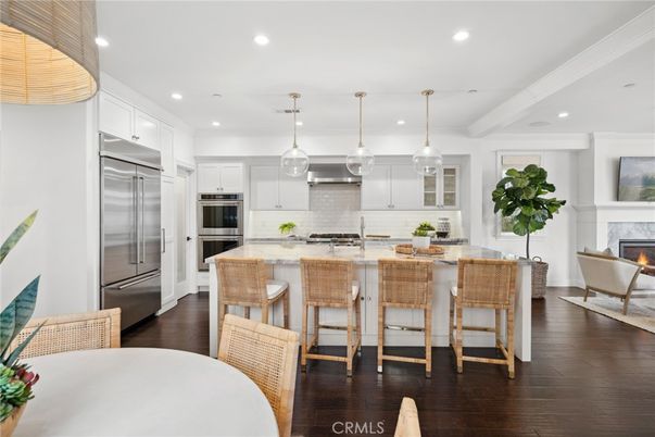 Fireplace, Interior, Kitchen, Pendant Lights, Recessed Lighting, Stainless Steel Appliances, Wood Texture Flooring