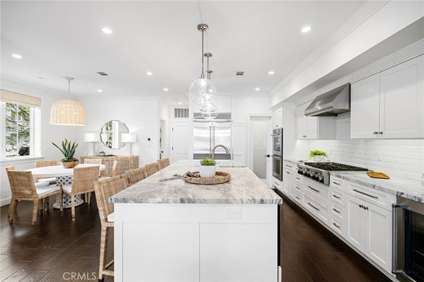 Dining room, Interior, Kitchen, Pendant Lights, Recessed Lighting, Stainless Steel Appliances, Wood Texture Flooring