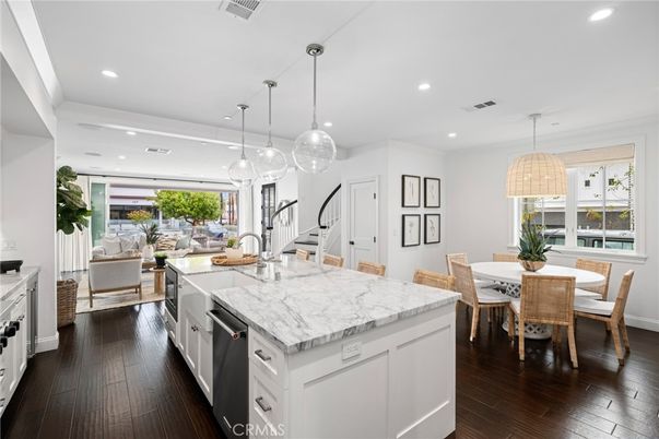 Dining room, Interior, Kitchen, Living room, Pendant Lights, Recessed Lighting, Stainless Steel Appliances, Wood Texture Flooring