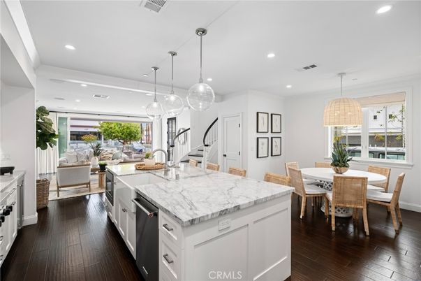 Dining room, Interior, Kitchen, Living room, Pendant Lights, Recessed Lighting, Stainless Steel Appliances, Wood Texture Flooring