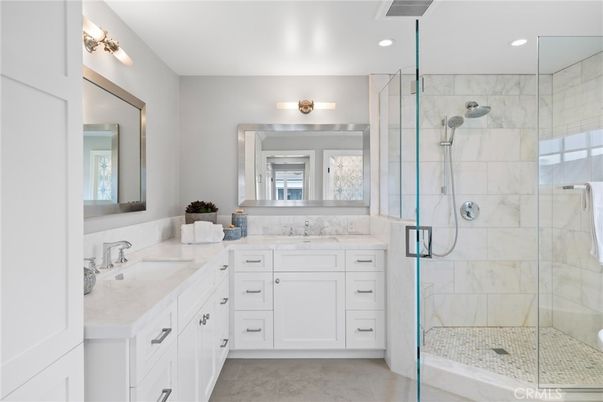 Bathroom, Dual Sink Vanities, Glass Shower, Interior, Marble Walls, Recessed Lighting