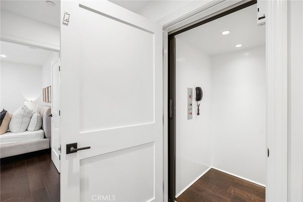Elevator, Interior, Recessed Lighting, Wood Texture Flooring