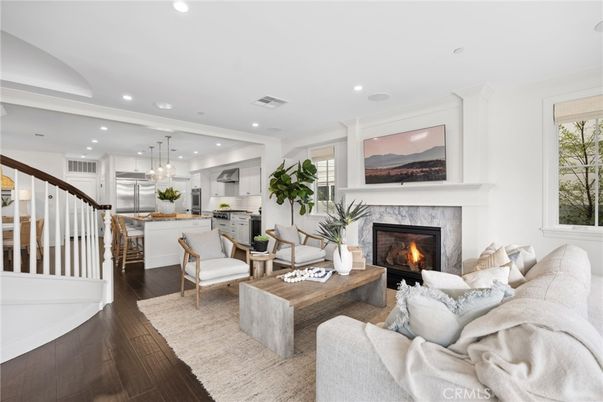 Fireplace, Interior, Kitchen, Living room, Pendant Lights, Recessed Lighting, Stainless Steel Appliances, Wood Texture Flooring