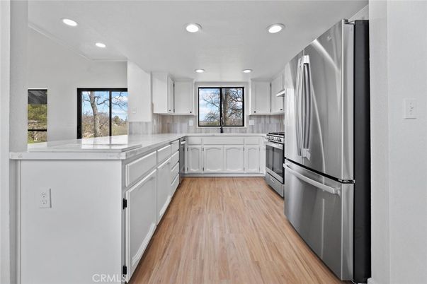 Interior, Kitchen, Recessed Lighting, Stainless Steel Appliances, Wood Texture Flooring