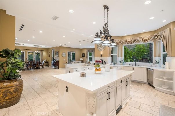 Chandelier, Dining room, Interior, Kitchen, Pendant Lights, Recessed Lighting, Stainless Steel Appliances