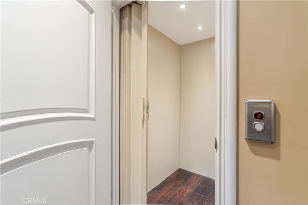 Elevator, Interior, Recessed Lighting, Wood Texture Flooring
