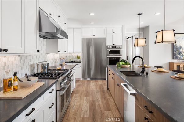 Interior, Kitchen, Pendant Lights, Recessed Lighting, Stainless Steel Appliances, Wood Texture Flooring