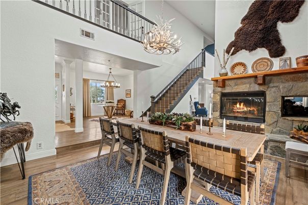 Chandelier, Dining room, Fireplace, Interior, Pendant Lights, Wood Texture Flooring