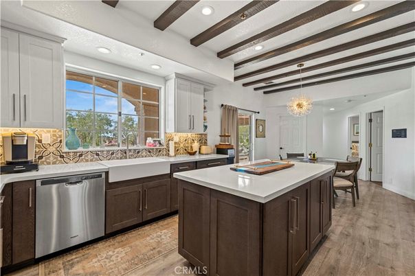Dining room, Interior, Kitchen, Pendant Lights, Recessed Lighting, Stainless Steel Appliances, Wooden Beams, Wood Texture Flooring