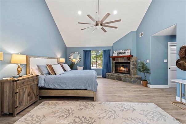Bedroom, Fireplace, Interior, Recessed Lighting, Wood Texture Flooring