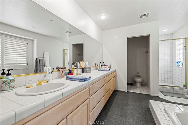 Bathroom, Dual Sink Vanities, Interior, Recessed Lighting, Tile Countertops