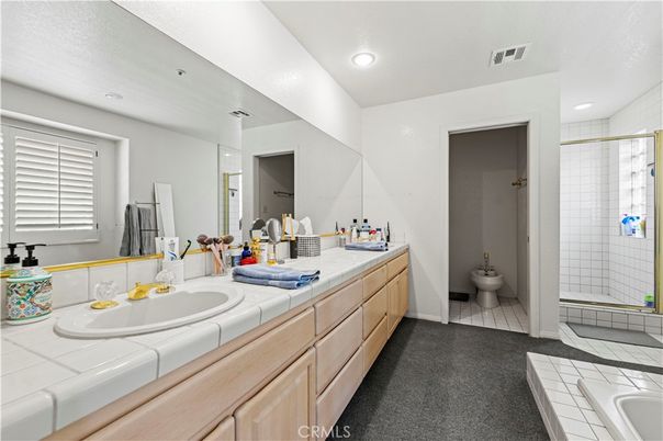 Bathroom, Dual Sink Vanities, Interior, Recessed Lighting, Tile Countertops