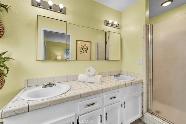 Bathroom, Dual Sink Vanities, Glass Shower, Interior, Recessed Lighting, Tile Countertops