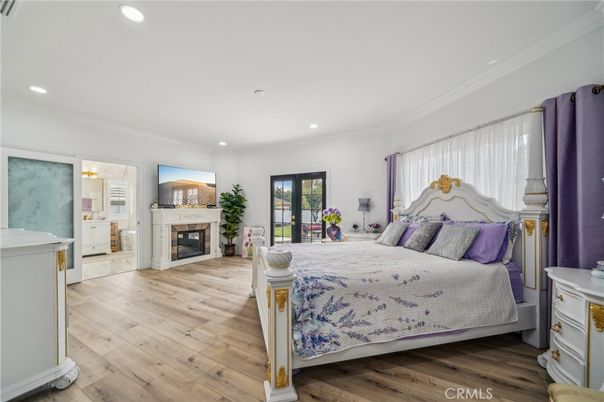 Bedroom, Fireplace, Interior, Recessed Lighting, Wood Texture Flooring