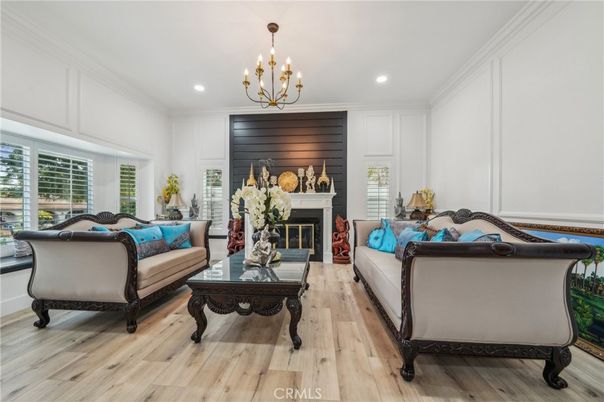 Chandelier, Fireplace, Interior, Living room, Recessed Lighting, Wood Texture Flooring