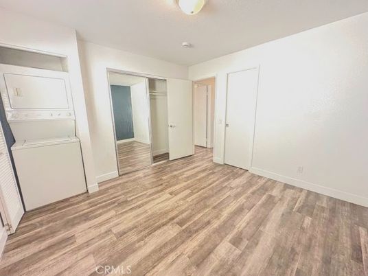 Empty room, Interior, Utility Closets, Washer, Wood Texture Flooring