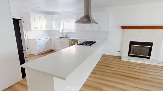 Fireplace, Interior, Kitchen, Recessed Lighting, Wood Texture Flooring