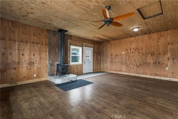 Empty room, Fireplace, Interior, Recessed Lighting, Wooden Ceilings, Wood Texture Flooring, Wooden Walls