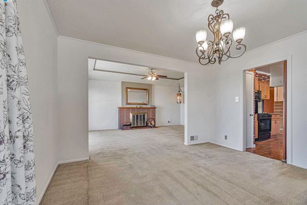 Chandelier, Empty room, Fireplace, Interior