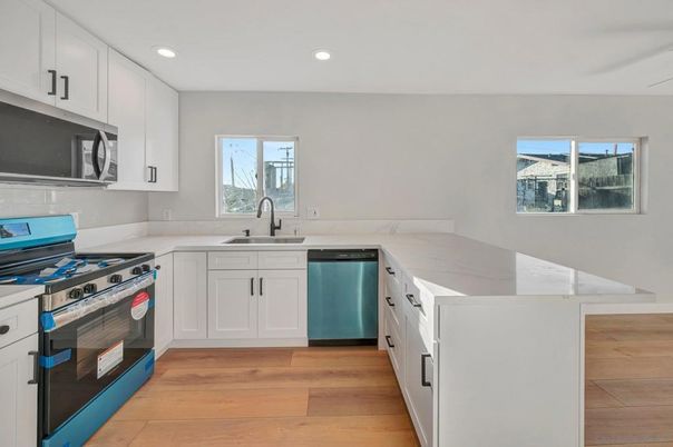 Interior, Kitchen, Recessed Lighting, Stainless Steel Appliances, Wood Texture Flooring