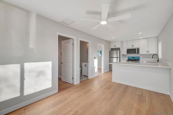 Interior, Kitchen, Recessed Lighting, Stainless Steel Appliances, Wood Texture Flooring
