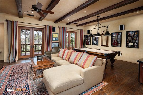 Billiard Table, Game Room, Interior, Living room, Pendant Lights, Recessed Lighting, Wooden Beams, Wood Texture Flooring