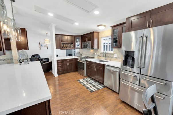 Chandelier, Interior, Kitchen, Recessed Lighting, Stainless Steel Appliances, Wood Texture Flooring
