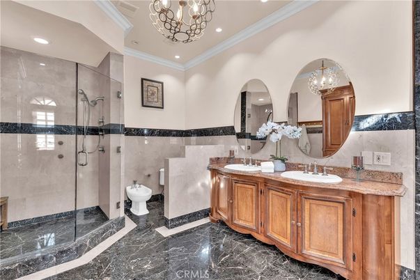 Bathroom, Chandelier, Dual Sink Vanities, Glass Shower, Interior, Marble, Recessed Lighting