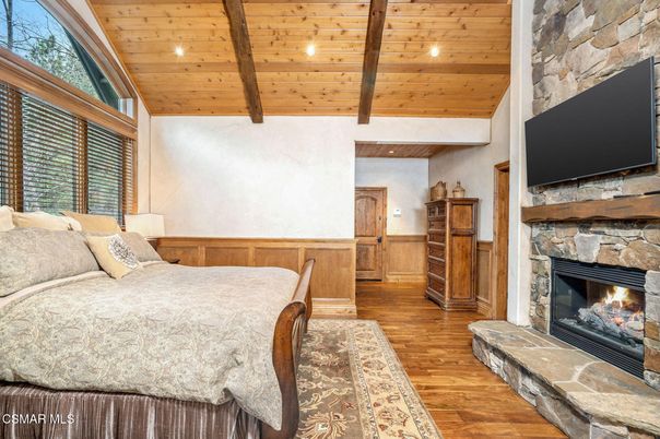 Bedroom, Fireplace, Interior, Recessed Lighting, Stone Walls, Wooden Beams, Wooden Ceilings, Wood Texture Flooring