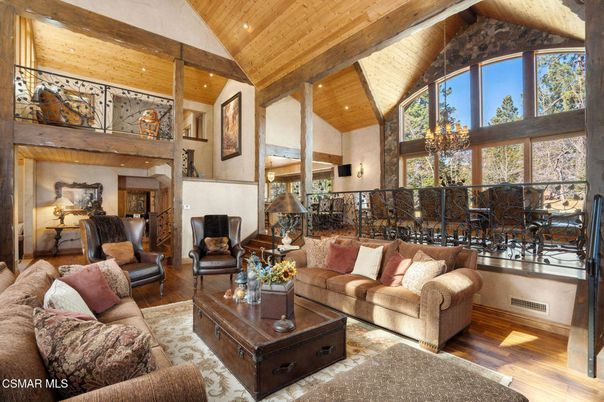 Chandelier, Dining room, Fireplace, Interior, Living room, Recessed Lighting, Wooden Beams, Wooden Ceilings, Wood Texture Flooring