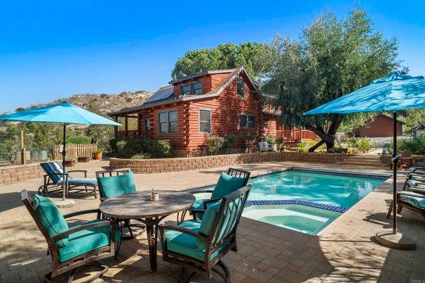 Exterior, Pool, Solar Panels