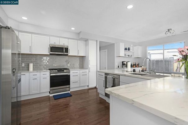 Interior, Kitchen, Recessed Lighting, Stainless Steel Appliances, Wood Texture Flooring